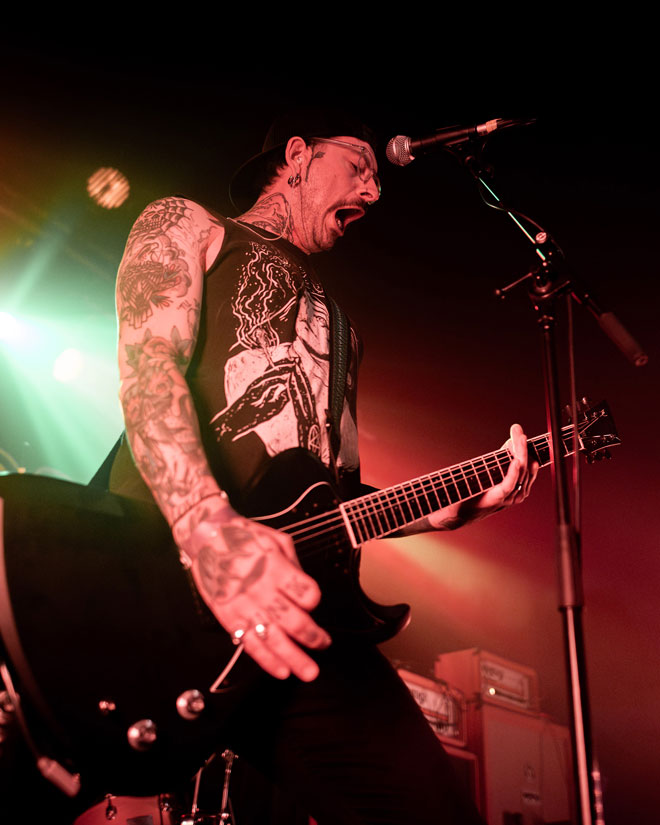 Guitarist vocalist from Acid Throne performing in London