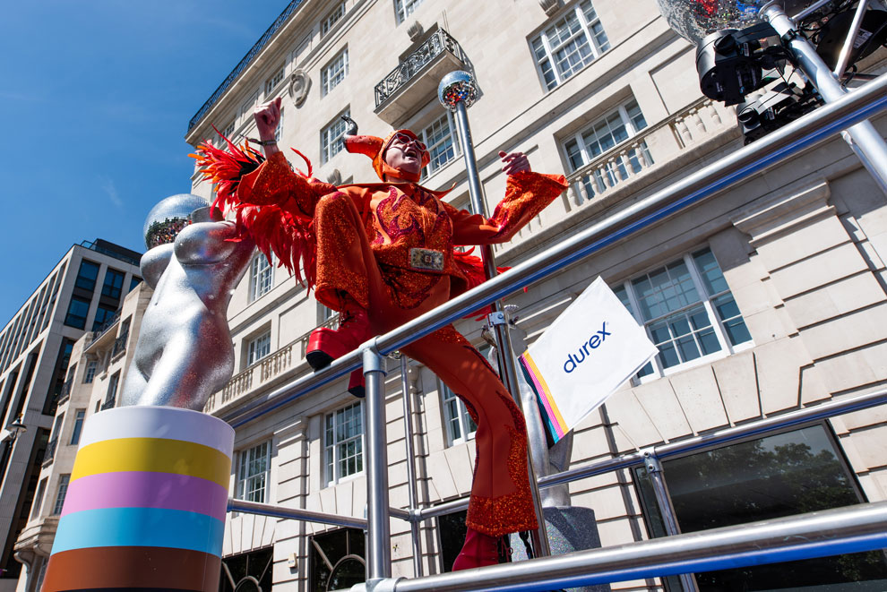 An Elton John lookalike at London Pride 2024 on the Durex float