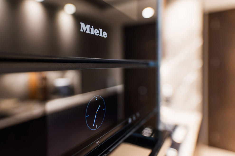 Close up of a Miele oven in a high-end, prestigious apartment
